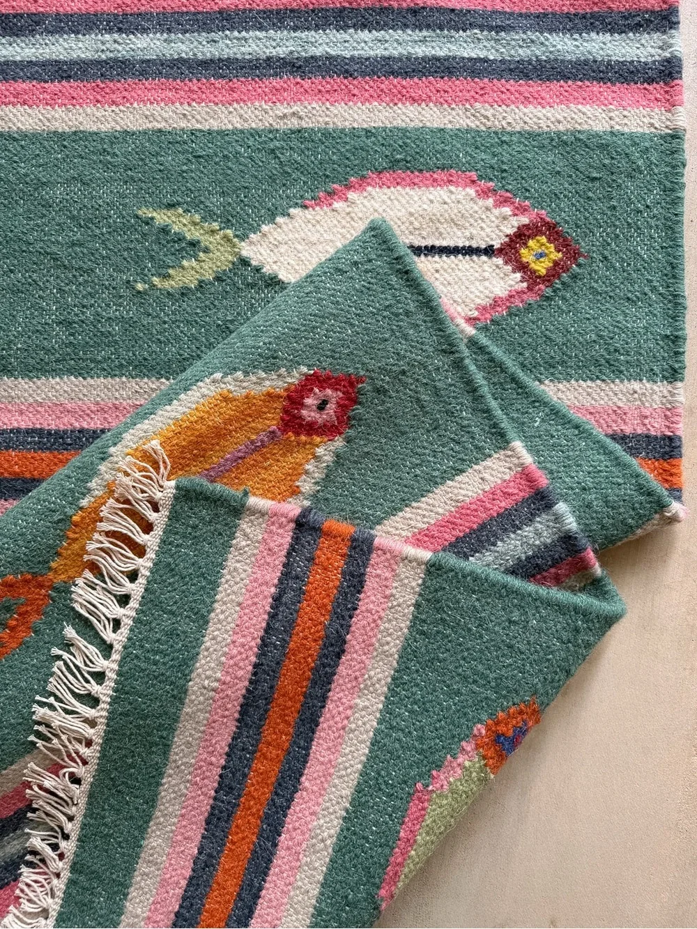 Handwoven Fish Motif Rug - Green with Multicolor Accents